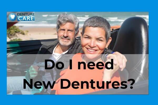 Smiling couple with new dentures fitted by a clinical dental technician